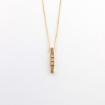 K035 Yellow Gold Alliance Necklace with 0.12ct diamonds.