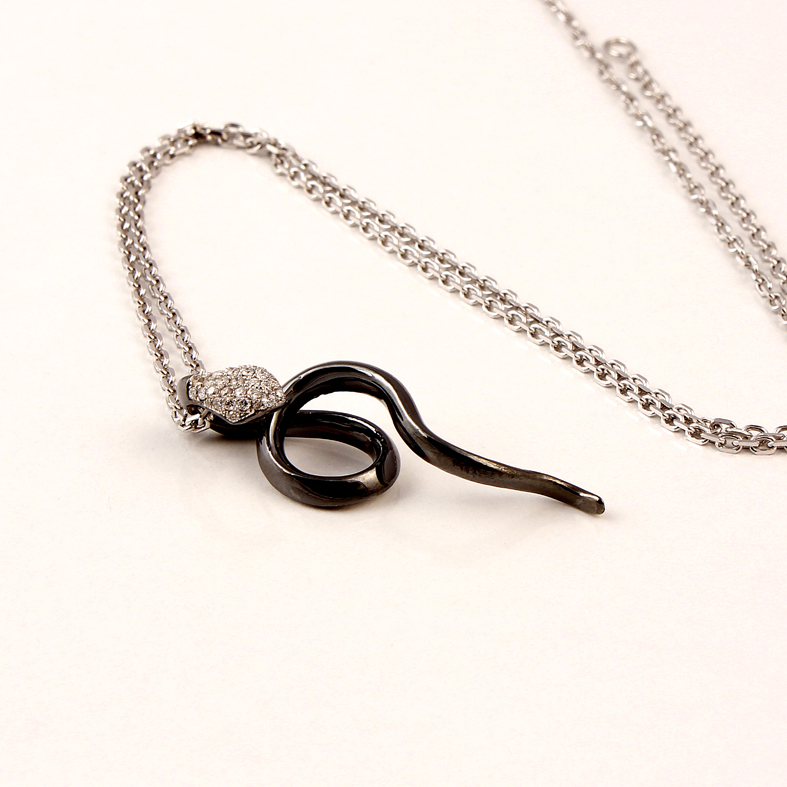 P03D White Gold Snake Pendent with 0.18ct Diamonds