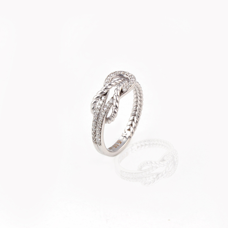 R186 White Gold Infinity Ring With 0.19ct Diamonds