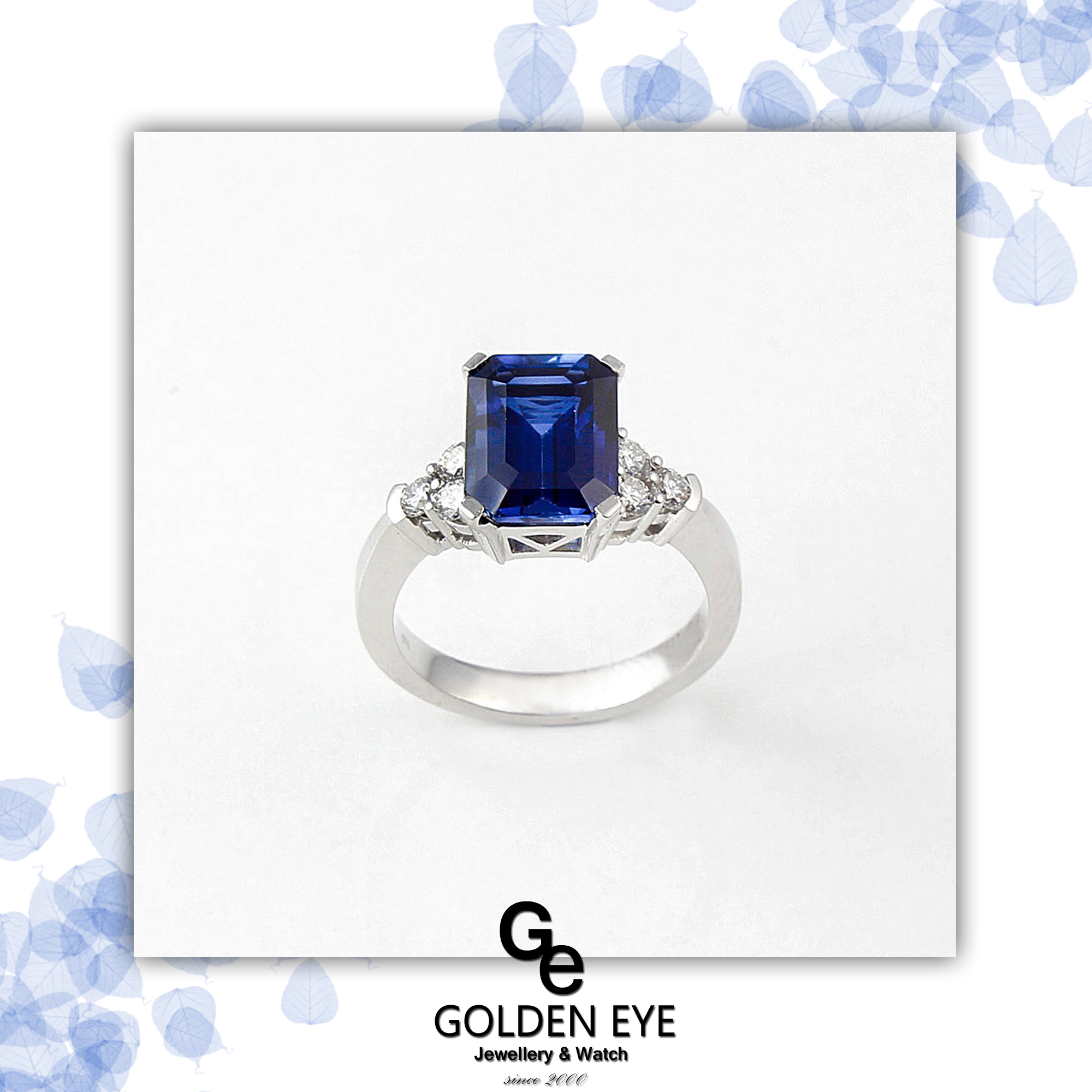 R033A Prsten z bílého zlata s modrým safírem a diamanty