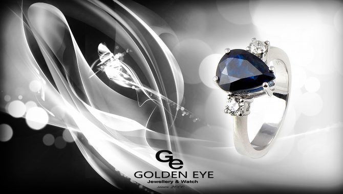 R033B Inel din aur alb cu safir albastru și diamante