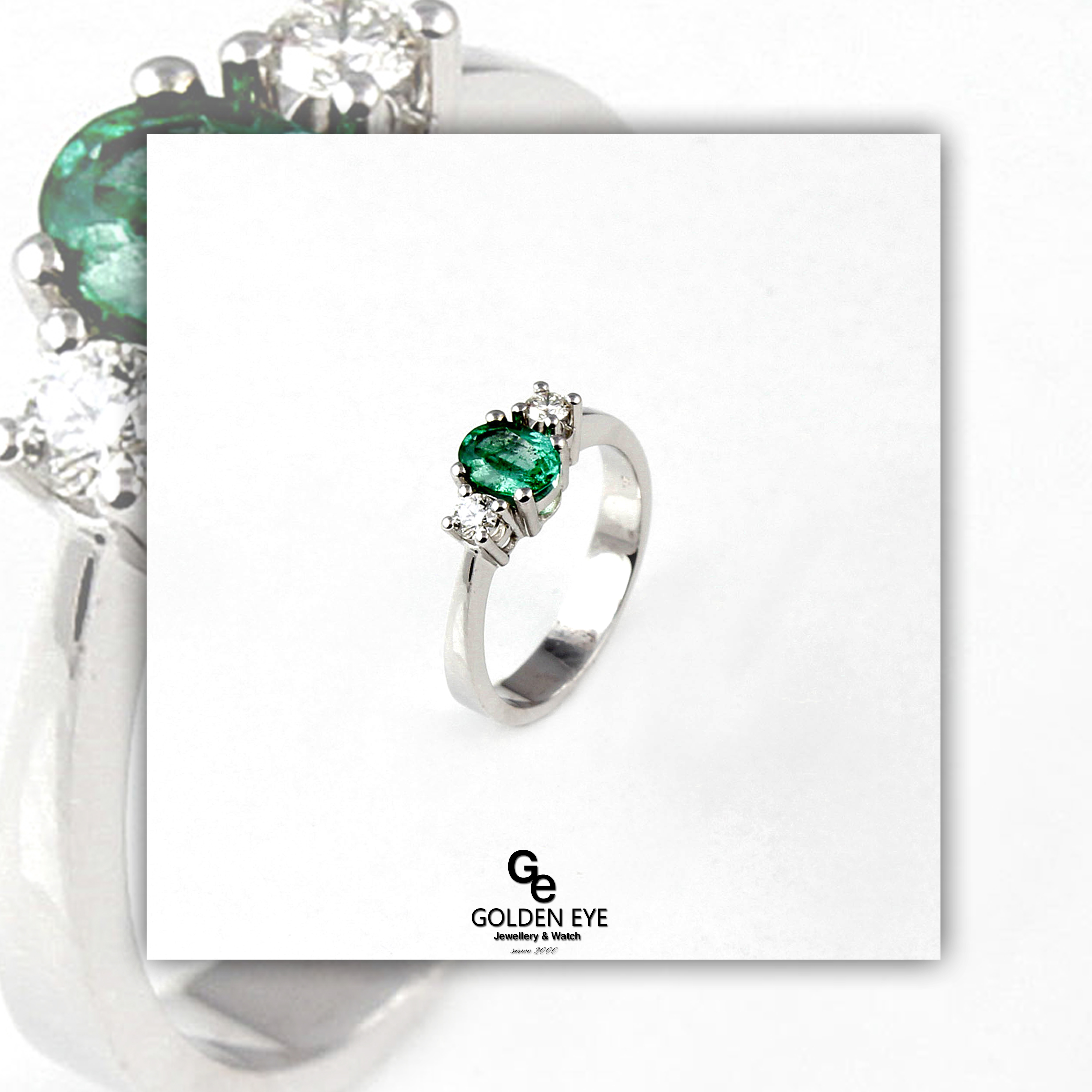 R034B White Gold Ring with Emerald and Diamonds