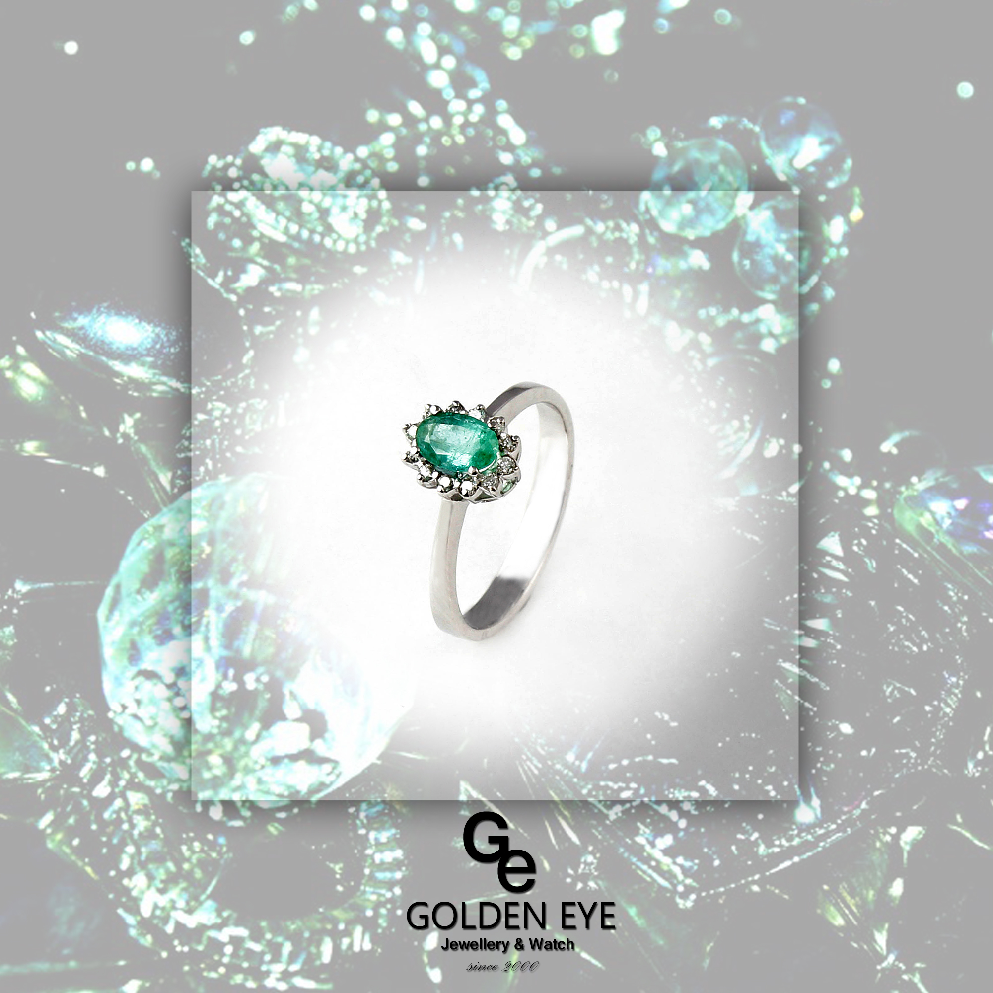 R035A hvid guld Ring med Emerald og diamanter